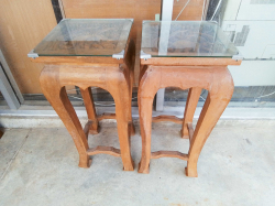 A Pair of Carved Side Tables Glass tops. W.30 H.72 Cm.
