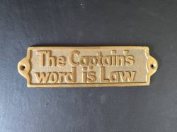 A solid brass maritime ship plaque