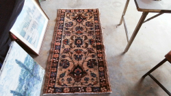A Small Antique  Carpet.
W.75 L.145 Cm.