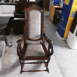 AN EXQUISITE SOLID ROSEWOOD ROCKING CHAIR w BRASS INLAY & HAND CARVED DETAIL