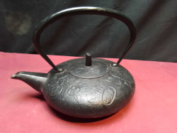 A Lovely Old Teavana Cast Iron Flat Tea Pot.