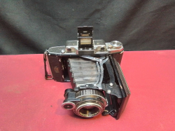 A Ziess Ikon Camera in Leather Case.