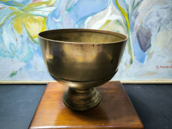 An antique Thai brass bowl with stand.