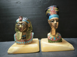  A pair of Egytian cold painted bronze of King Tut and Queen Nefertiti on marble base