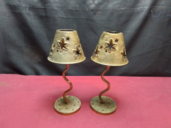 A Pair Of Brass Candle Holders.