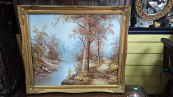An Oil on Canvas River Scene Landscape Gilt Framed. W.70 H.60 Cm.