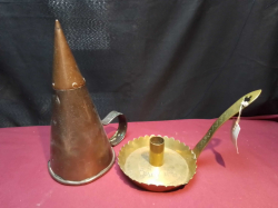 A Copper pouring funnel and an Arts craft brass chamberstick
