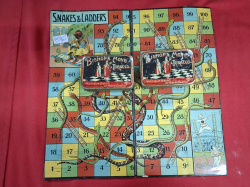 2 Old Bishop's Move Tobacco Tin. And an old Game snakes Ladders