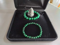 A Small Jade Natural Stone Ganesha and 2 Jade elastic Bracelets.
