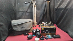A Nikon D3300 Camera with Tripods Charger etc. In A Carrying Case (Little used)