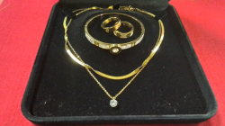 Gold Plated fashion two layer necklace bracelet and two rings.