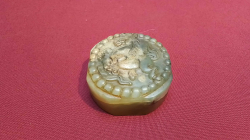A Chinese green jade seal carved with horse to top and engraved seal to bottom