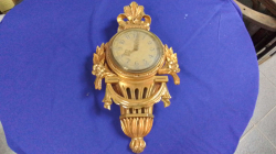 A Swedish Hand Carved Gilt Wood Cartel Clock Now Working by Battery. W.30 H.55 Cm.