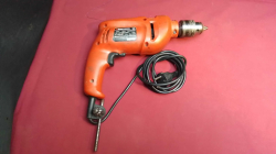 A Black & Decker 710 Watt Electric Hammer Drill.