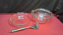 A Stainless Steel Potato Masher and 3 Ryrex Dishes.
