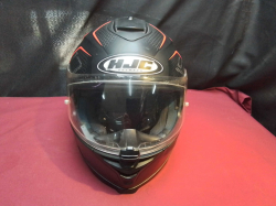 A HJC Black Motorcycle Helmut. (XL)