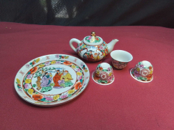 A Chinese Miniture Tea Set Familie Rose on tray.