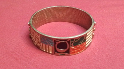 An original early Enameled Coach Bangle.