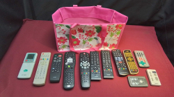 Job lot of Mixed Remote Control with Pink bag.