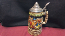 A Musicial Germany beer Stein with Pewter lid.