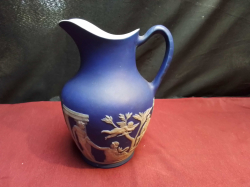 A Fine 19th Century Dark Blue Jasperware Wedgwood Jug in the Style of the Portland Vase.W.15 H.19 Cm.
