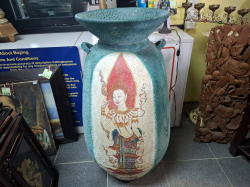 A Large Terracotta Pot painting an Angel. Approx. H.105 W.42 cm
