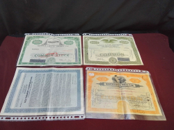 4 Antique stock certificates.