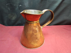 An Old English Copper Beer Jug.