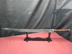 A ninja sword on a stand. L.84 Cm.  