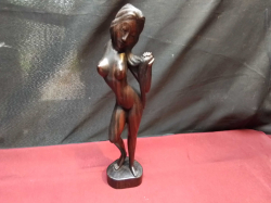 A Wooden Figure of a Lady. H.30 Cm.