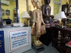 A Standding Buddha on a Lotus, hand carved with four colors of applied glass gem on a black base, APPROX. 170 cm High including base. , 55 cm Wide.