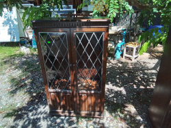 A mid Century Oak display drinks Cabinet (89). W.80 D.36 H.130 Cm.