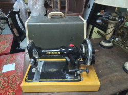 A Jones Table Top Hand Sawing Machine with Case.