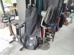 A Large Black Travel golf bag (as golf)