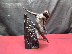 A patinated cold cast resin sculpture by acclaimed sculptor Carol Camps 11 inches high. H.30 W.20 Cm.