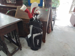 A Set of Golf Clubs and Bag.
