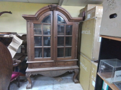 A Solid Teak Dome Top Bevel Glass Bookcase on Ball and Claw Feet with key. W.148 D.66 H.225 Cm.
