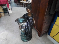 Lady with Cherub, cast iron with brass highlights.40 Cm. Wide 73 Cm. High.