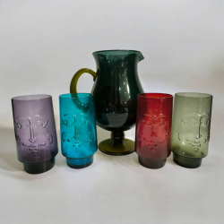 A 4 pcs. Man face designed on color glasses and one glass pitcher