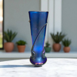 A Zellique studio art glass iridescent cobalt blue twist spiral fan vase signed to the base. H.19 Cm.