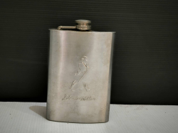 A stainless steel Johnnie Walker hip flask