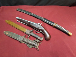 2x US Daggers L.33,40 Cm., 1 Antique Gun L.38 and 1 Sword L.60 Cm.