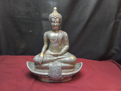 A Metal Buddha in Sitting Position. H.38 W.33 Cm.