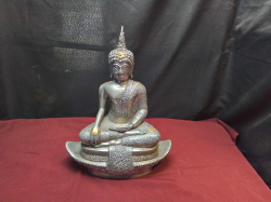 A Metal Buddha in Sitting Position. H.43 W.33 Cm.