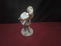 A 1991 retired NAO by LLADRO figurine