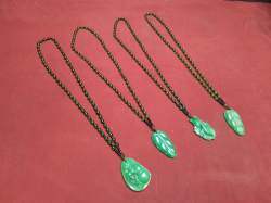 4 Dark Green Jade Pendants on Jade Necklaces.