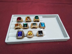 10 high quality gold plated rings with tray.