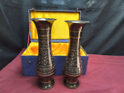 A pair of black gold brass vases in a box. W.9 H.27 Cm.