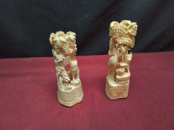 A vintage Asian intricately carved pair of bone animal/bird figurines 11cm high