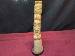 A 19th century antique African woman carved bone figure on ebony stand 19cm high